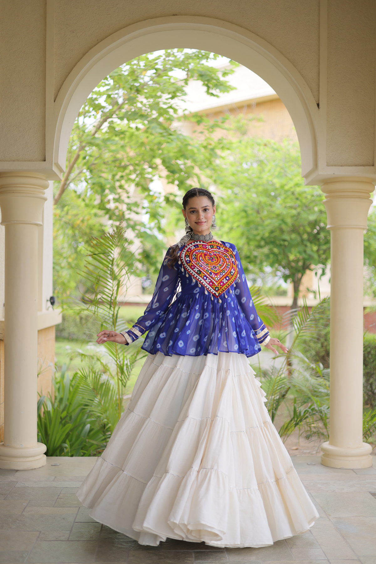 Women’s Designer Black Embroidered Peplum Top with White Flared Lehenga Skirt