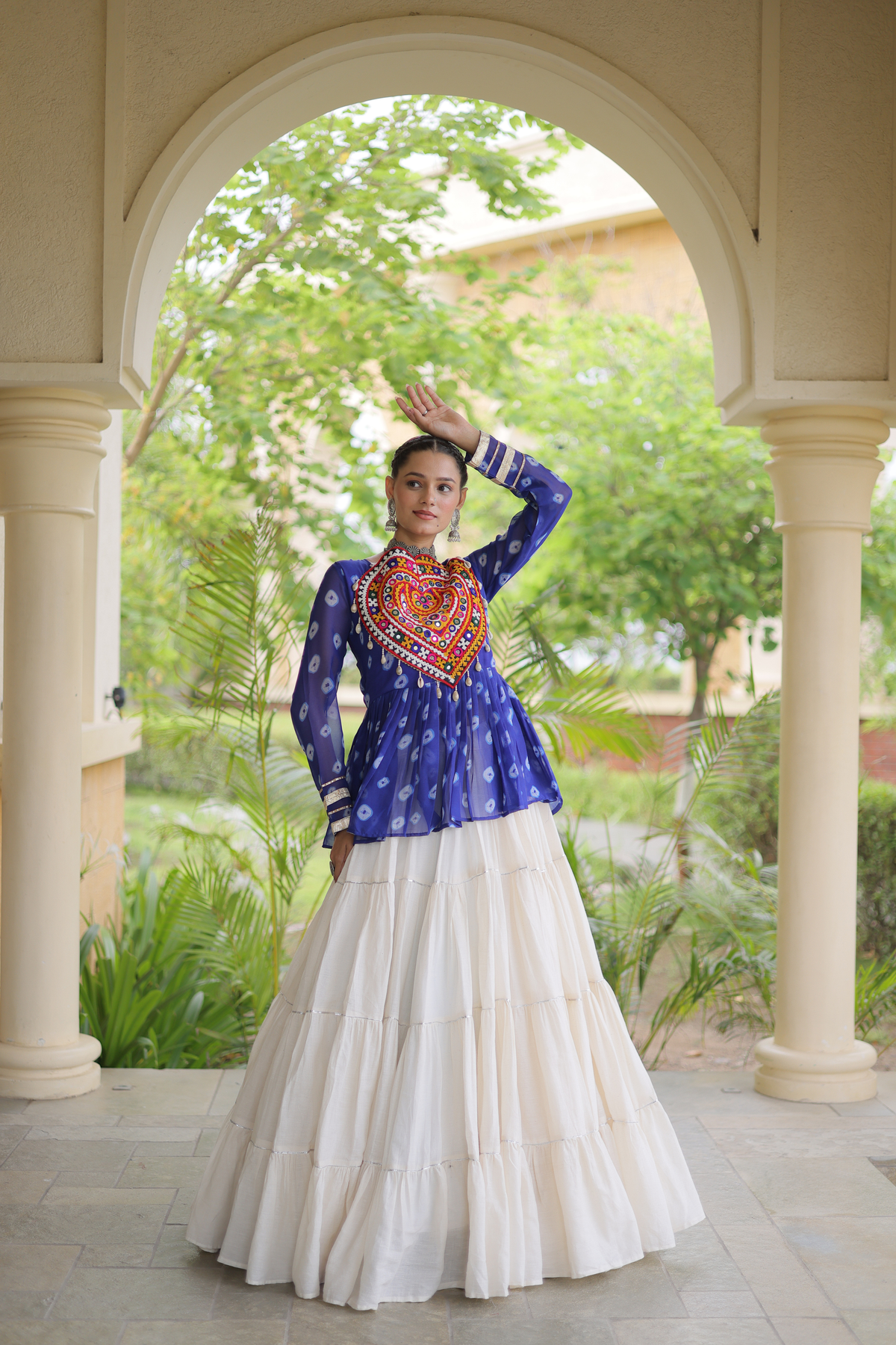 Women’s Designer Black Embroidered Peplum Top with White Flared Lehenga Skirt