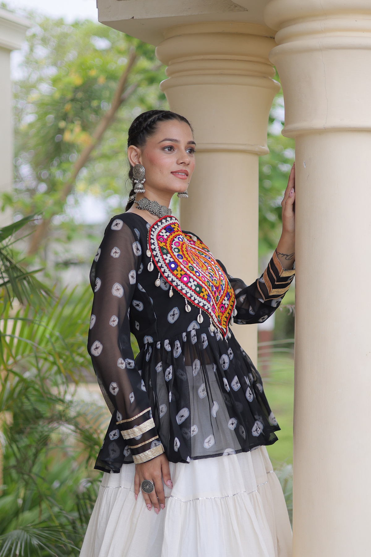 Women’s Designer Black Embroidered Peplum Top with White Flared Lehenga Skirt