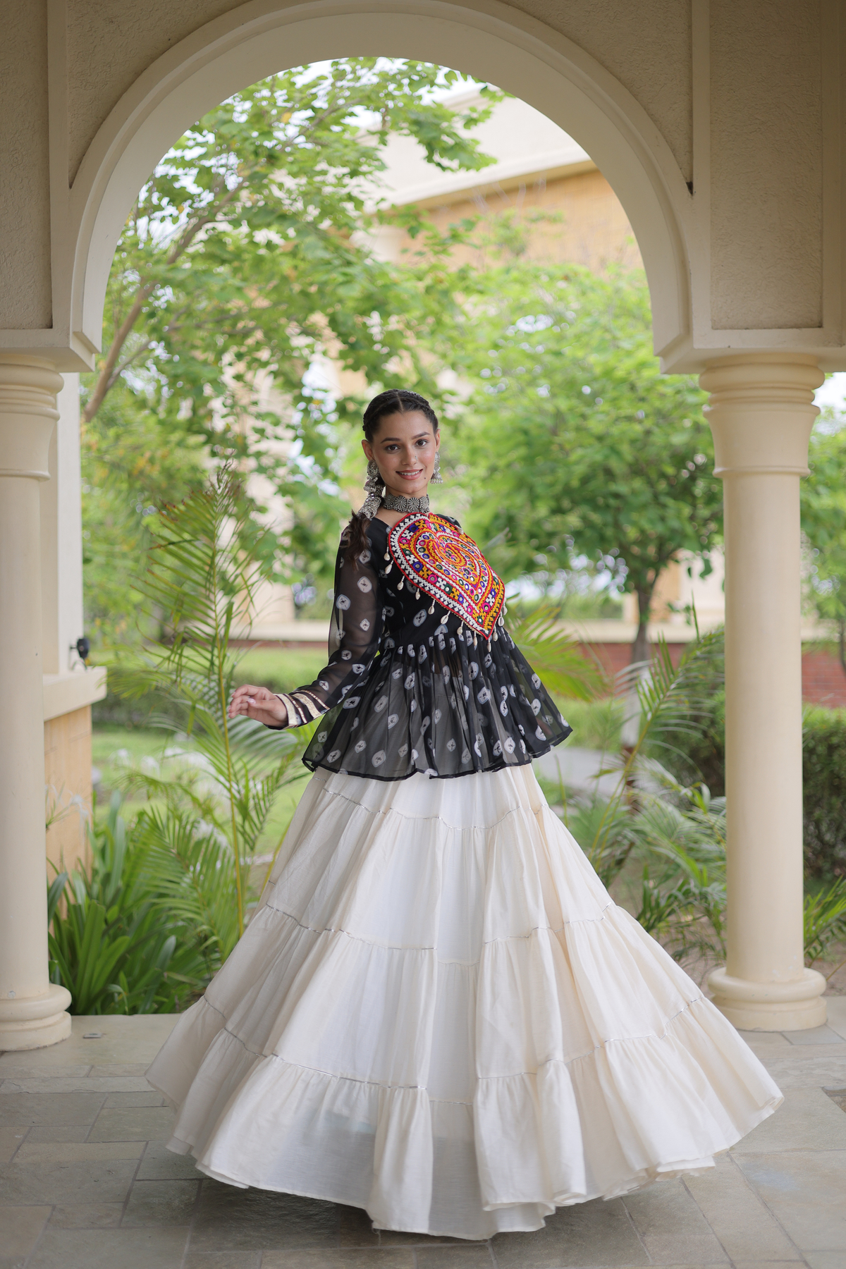 Women’s Designer Black Embroidered Peplum Top with White Flared Lehenga Skirt