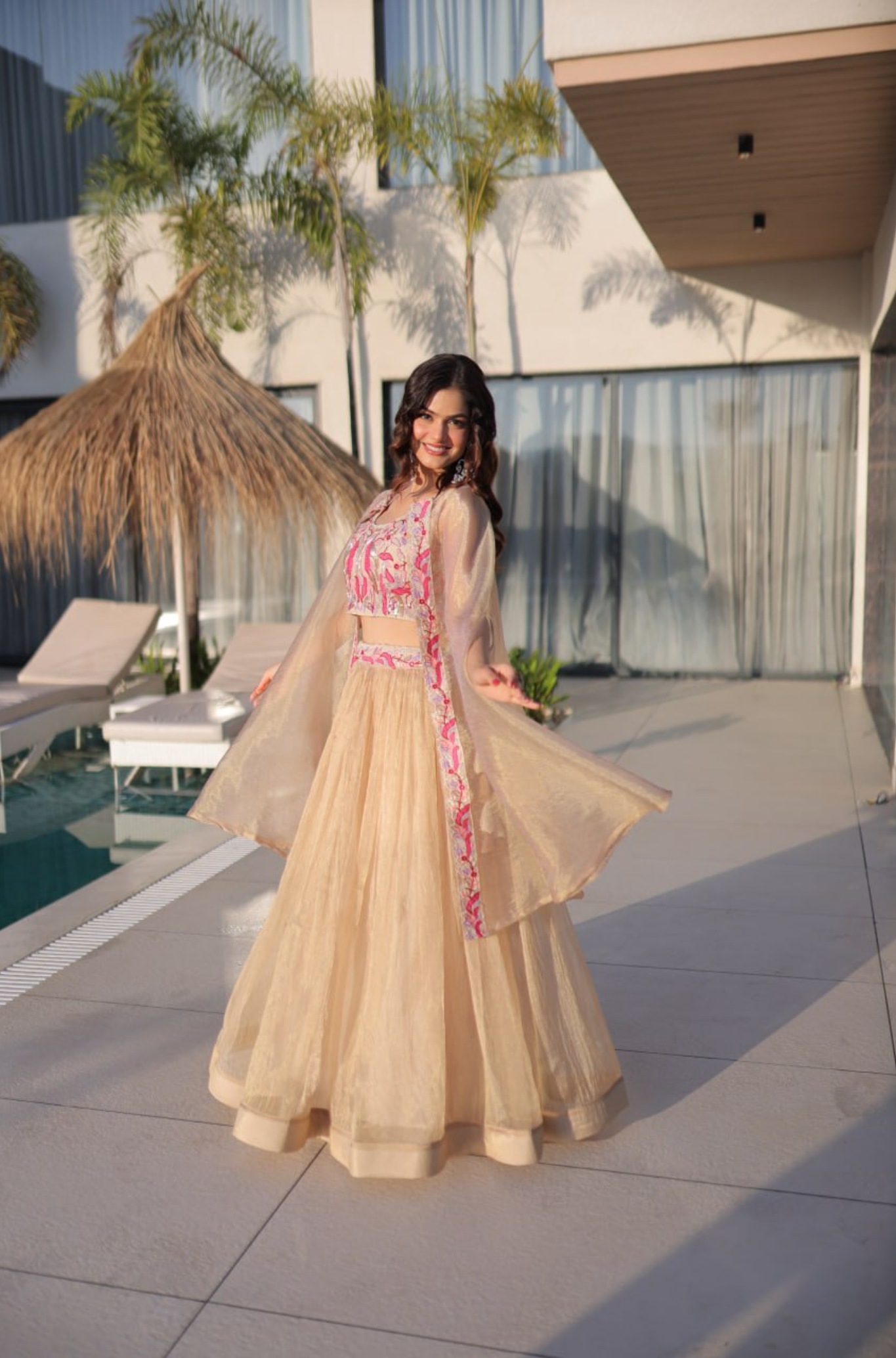 Women Beige Organza Lehenga Choli with Cape Dupatta & Pink Embroidery