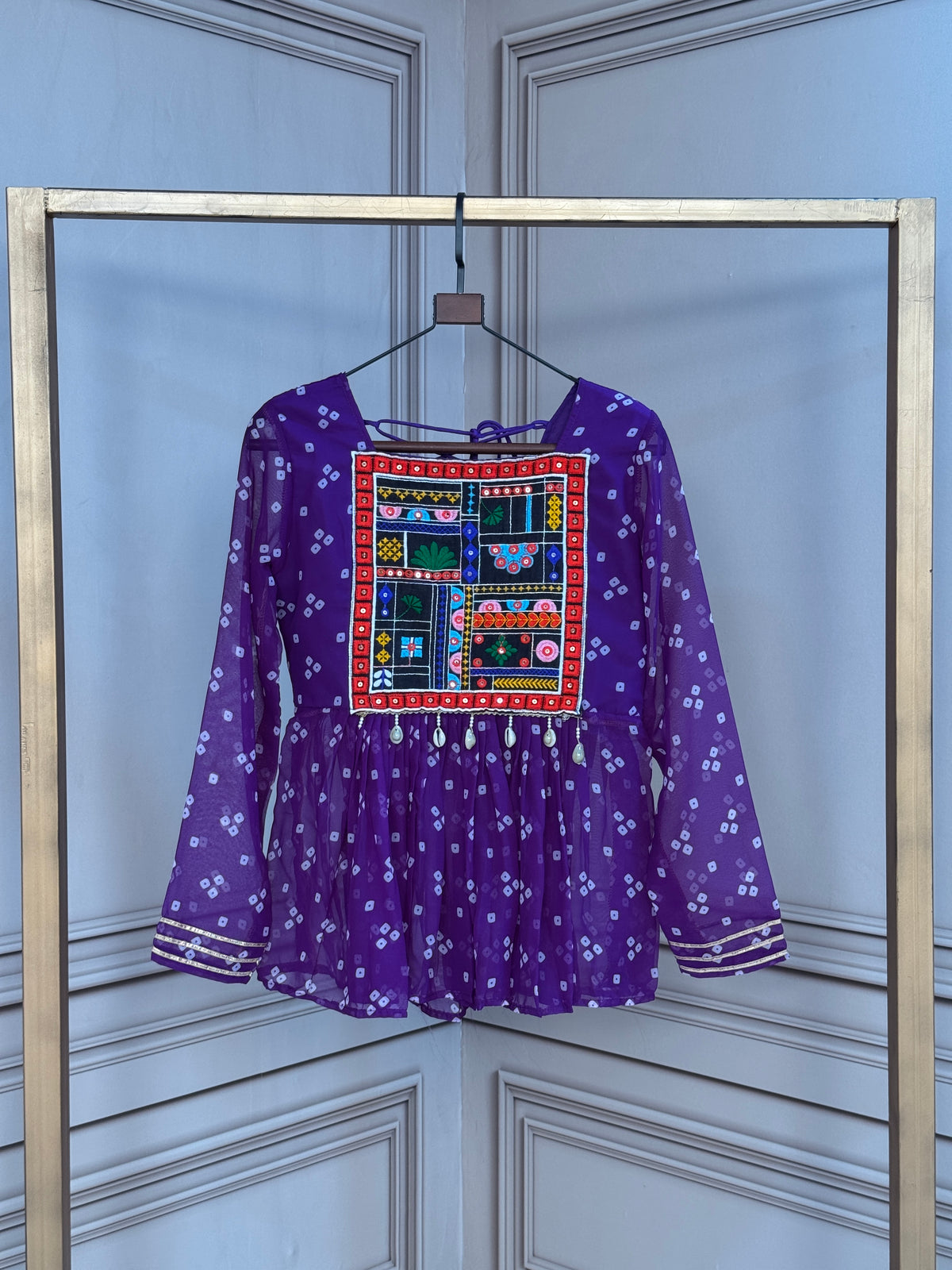 Designer Printed Peplum Top with Embroidered Yoke & Flared Hem