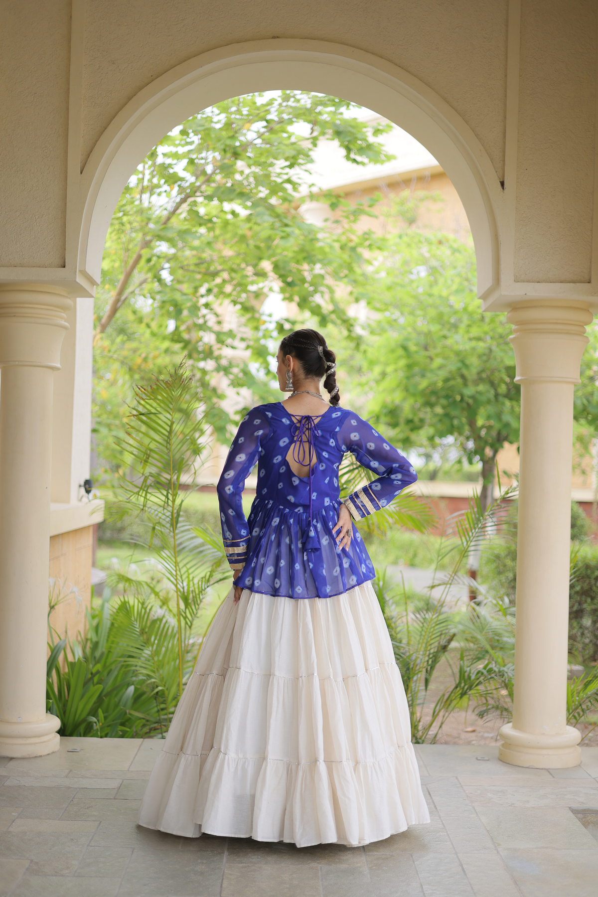 Women’s Designer Black Embroidered Peplum Top with White Flared Lehenga Skirt