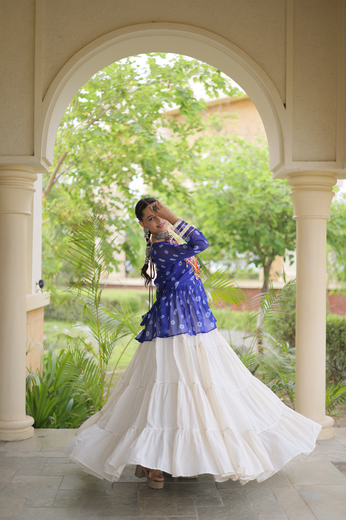 Women’s Designer Black Embroidered Peplum Top with White Flared Lehenga Skirt