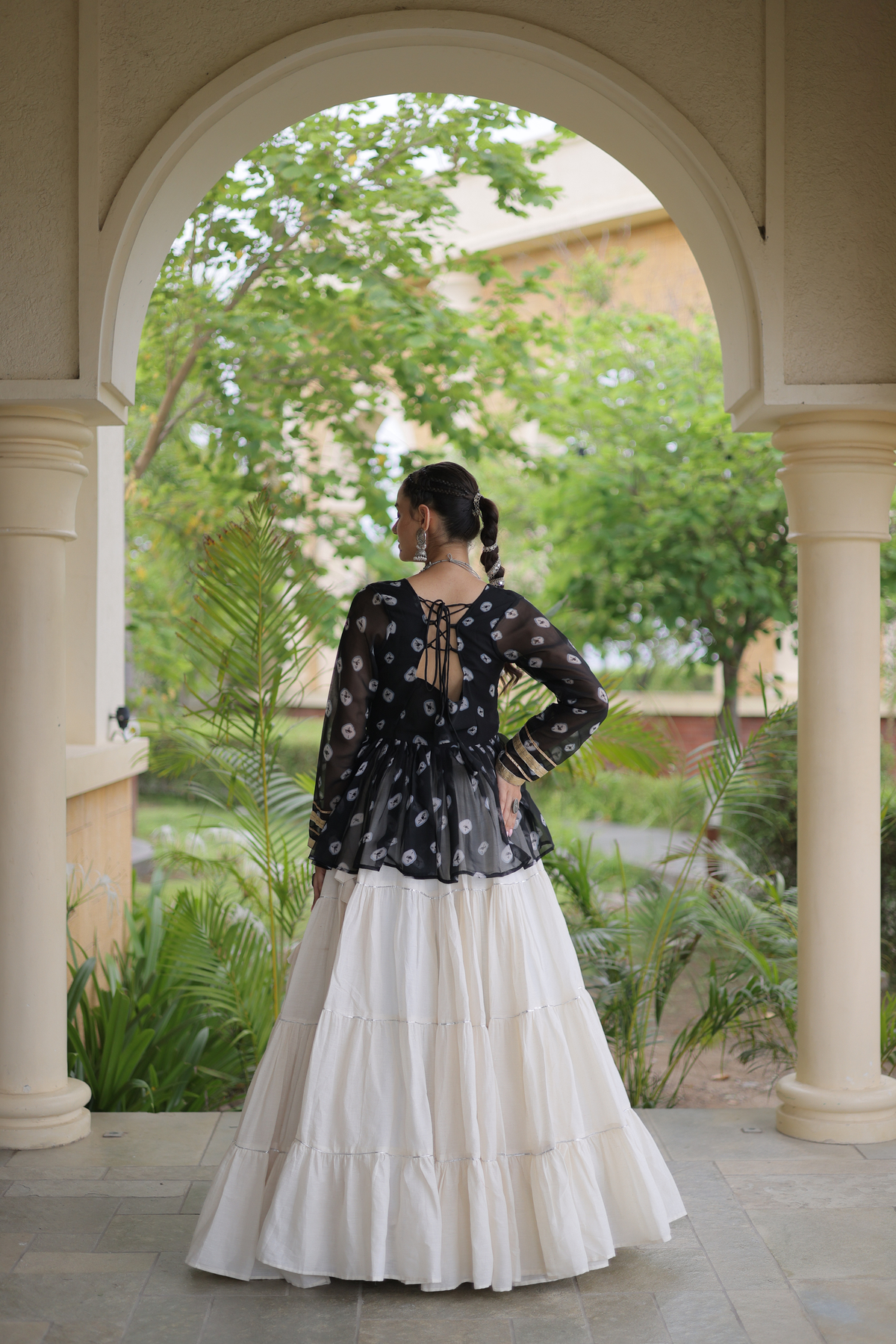 Women’s Designer Black Embroidered Peplum Top with White Flared Lehenga Skirt
