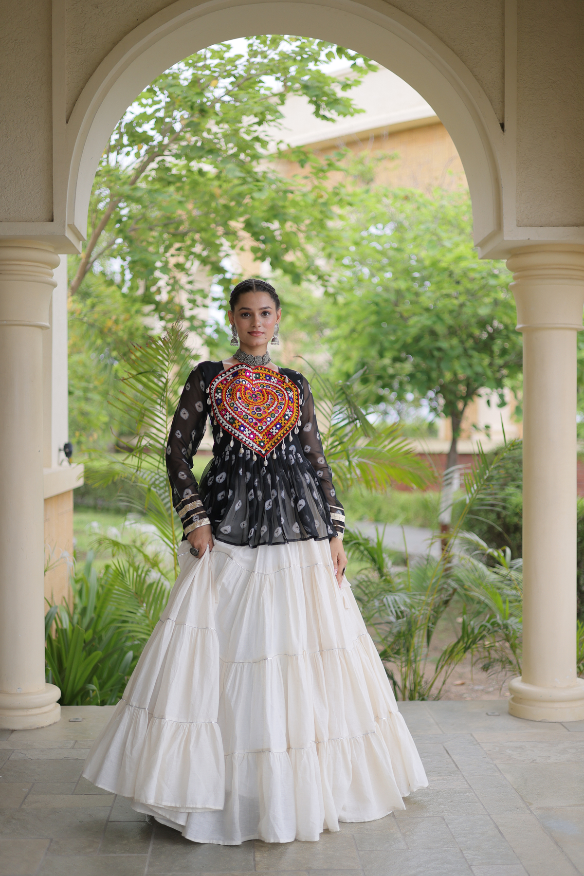 Women’s Designer Black Embroidered Peplum Top with White Flared Lehenga Skirt