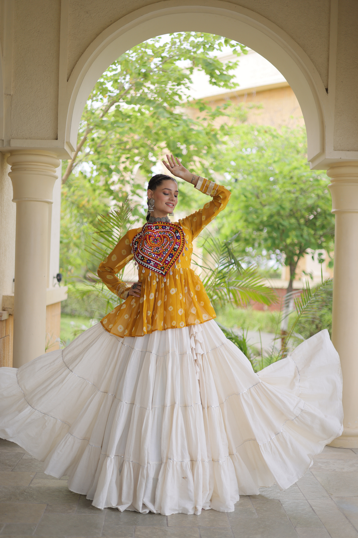 Women’s Designer Black Embroidered Peplum Top with White Flared Lehenga Skirt