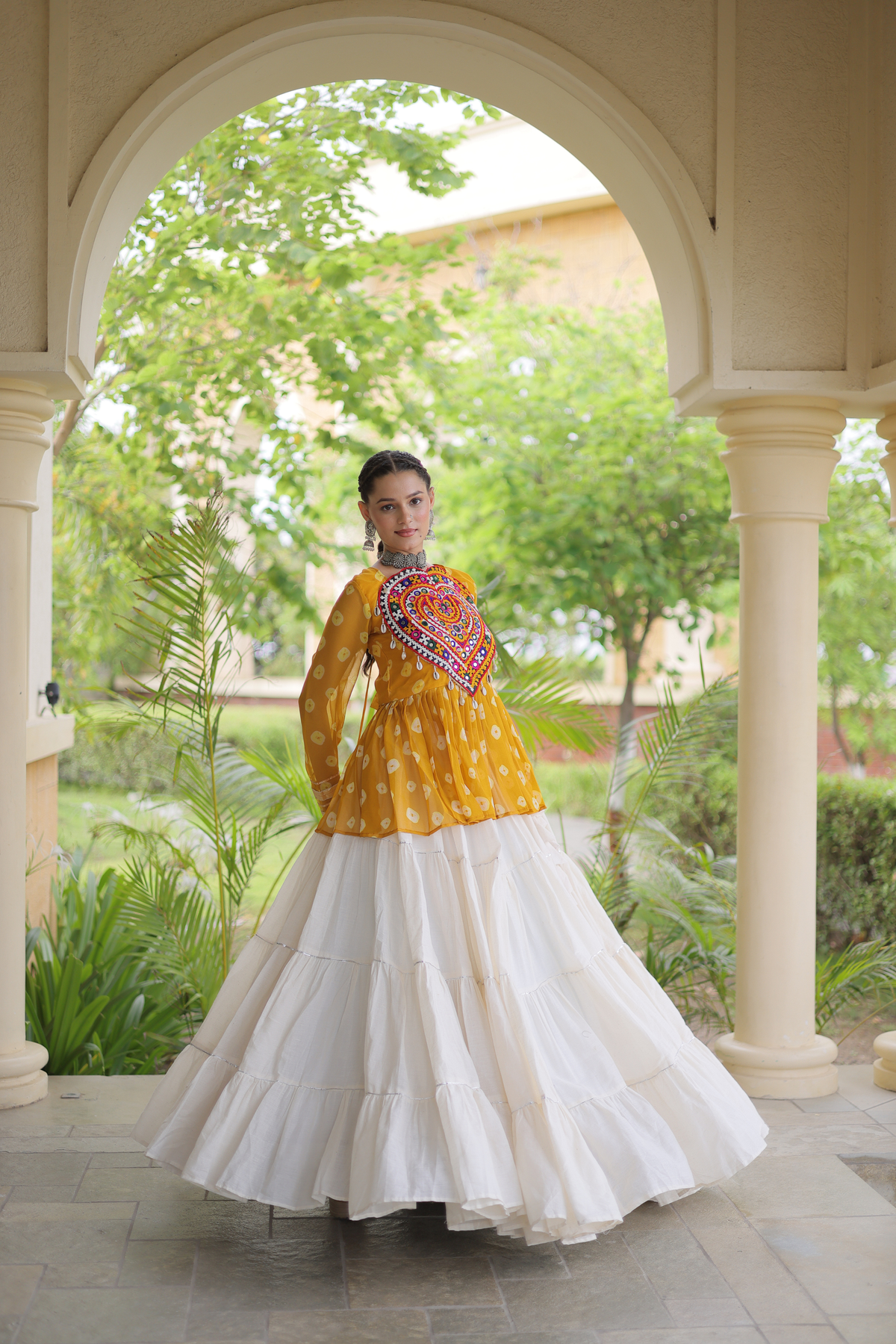 Women’s Designer Black Embroidered Peplum Top with White Flared Lehenga Skirt