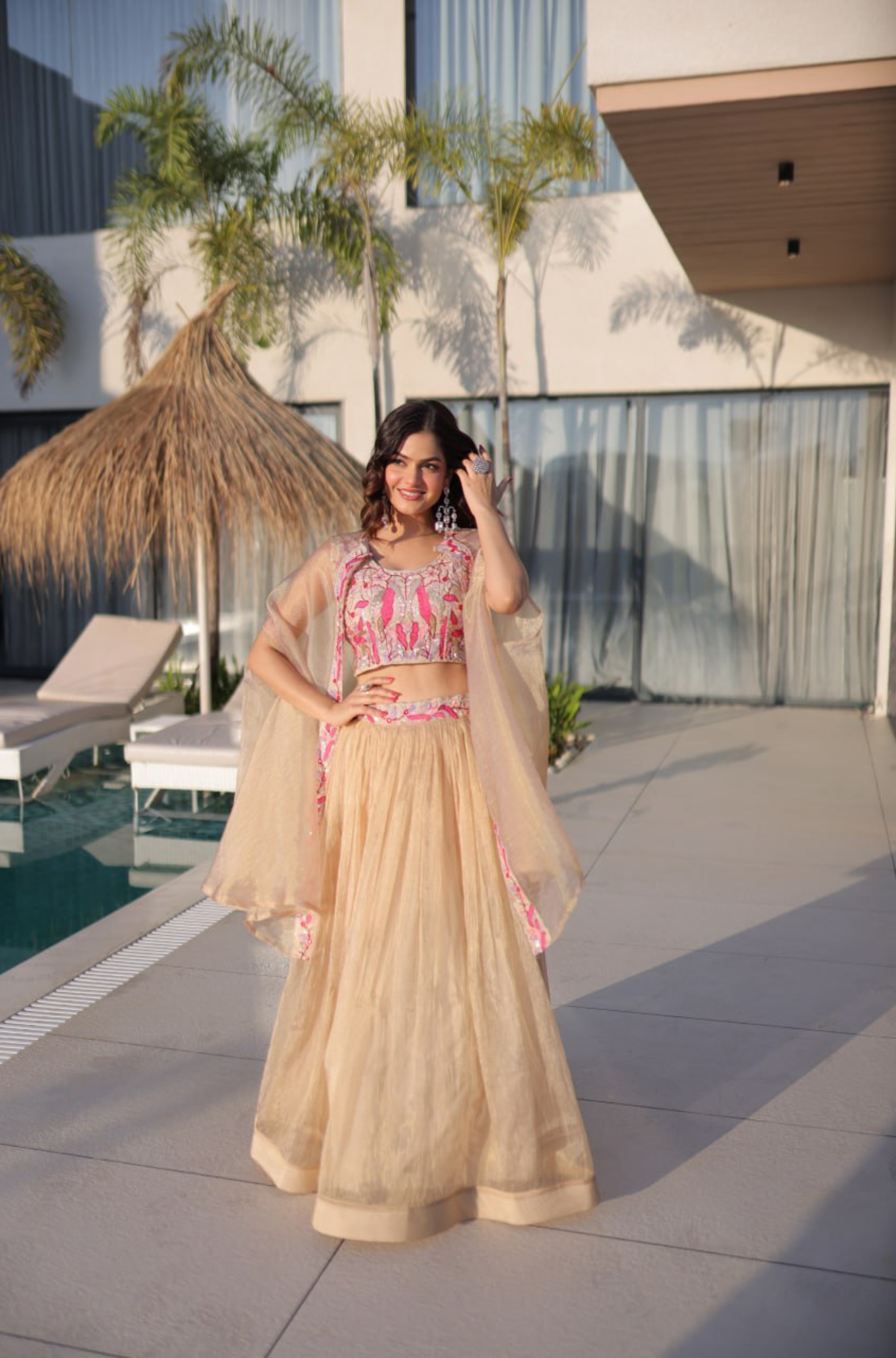 Women Beige Organza Lehenga Choli with Cape Dupatta & Pink Embroidery
